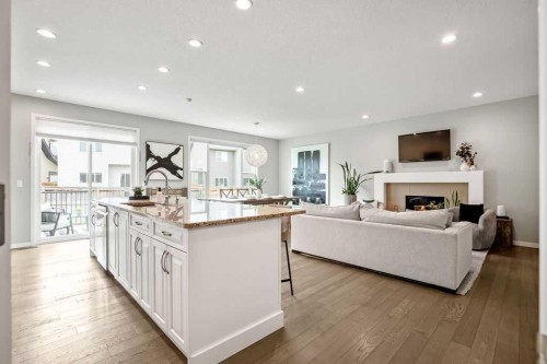 84 Auburn Glen View Se, Calgary, AB - Indoor Photo Showing Living Room With Fireplace