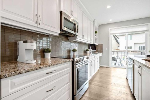 84 Auburn Glen View Se, Calgary, AB - Indoor Photo Showing Kitchen With Upgraded Kitchen
