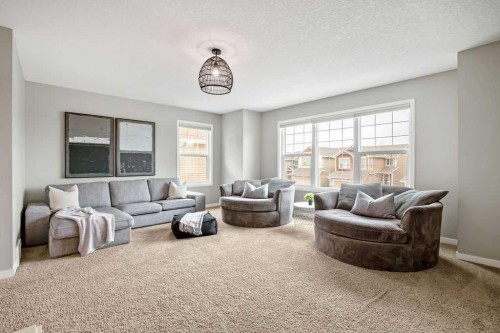 84 Auburn Glen View Se, Calgary, AB - Indoor Photo Showing Living Room