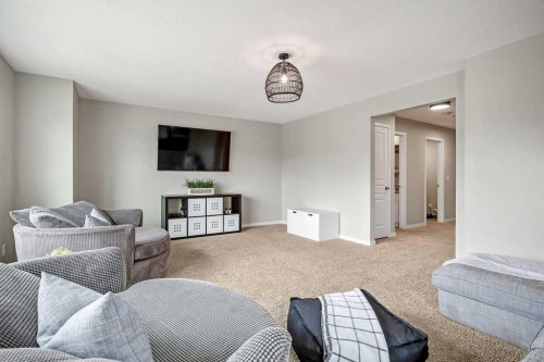 84 Auburn Glen View Se, Calgary, AB - Indoor Photo Showing Living Room