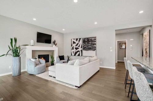 84 Auburn Glen View Se, Calgary, AB - Indoor Photo Showing Living Room With Fireplace
