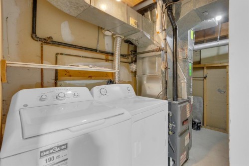 220 Cedarbrook Bay Sw, Calgary, AB - Indoor Photo Showing Laundry Room