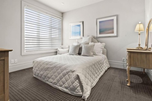 122 Aspen Ridge Place Sw, Calgary, AB - Indoor Photo Showing Bedroom