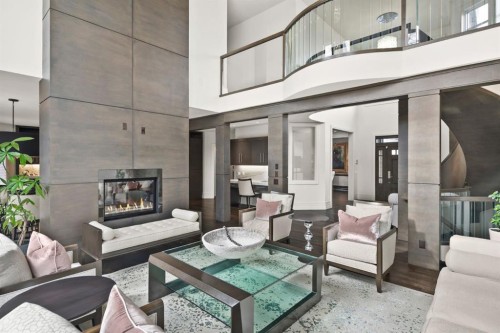 122 Aspen Ridge Place Sw, Calgary, AB - Indoor Photo Showing Living Room With Fireplace