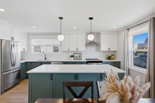 559 Deerpath Court Se, Calgary, AB - Indoor Photo Showing Kitchen With Stainless Steel Kitchen With Upgraded Kitchen