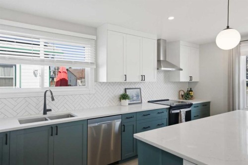 559 Deerpath Court Se, Calgary, AB - Indoor Photo Showing Kitchen With Stainless Steel Kitchen With Double Sink With Upgraded Kitchen