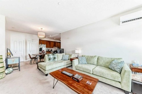 210-1005A Westmount Drive, Strathmore, AB - Indoor Photo Showing Living Room