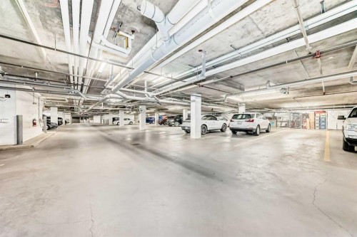 210-1005A Westmount Drive, Strathmore, AB - Indoor Photo Showing Garage