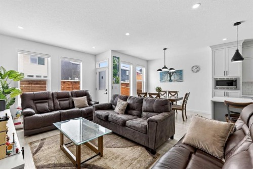 41 Copperhead Road Se, Calgary, AB - Indoor Photo Showing Living Room