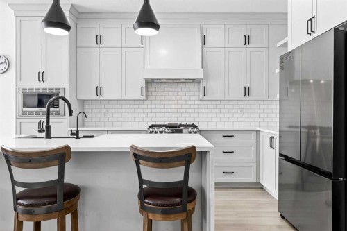 41 Copperhead Road Se, Calgary, AB - Indoor Photo Showing Kitchen With Upgraded Kitchen