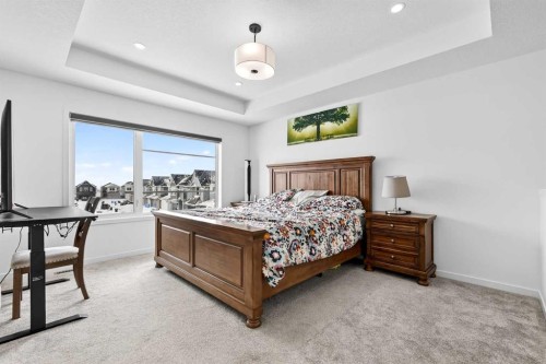 41 Copperhead Road Se, Calgary, AB - Indoor Photo Showing Bedroom