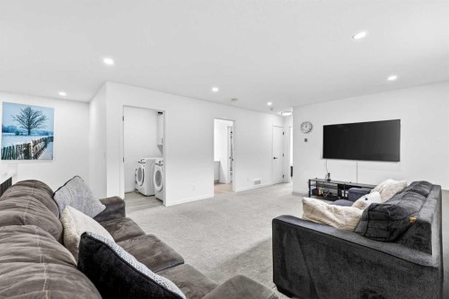 41 Copperhead Road Se, Calgary, AB - Indoor Photo Showing Living Room