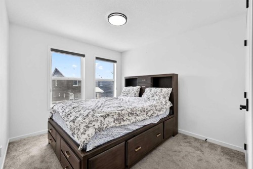 41 Copperhead Road Se, Calgary, AB - Indoor Photo Showing Bedroom
