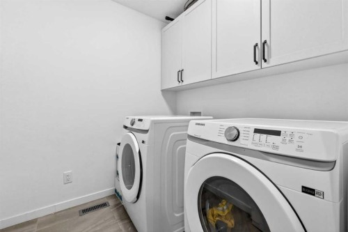41 Copperhead Road Se, Calgary, AB - Indoor Photo Showing Laundry Room