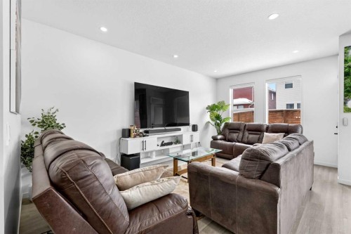41 Copperhead Road Se, Calgary, AB - Indoor Photo Showing Living Room