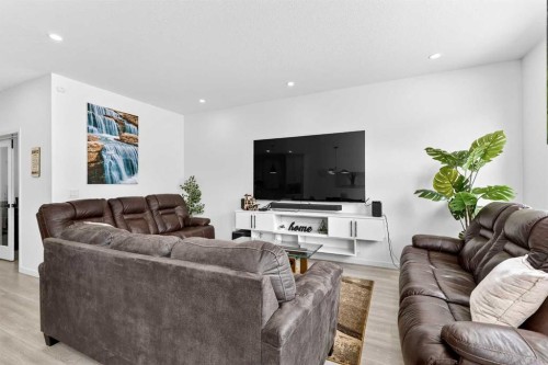 41 Copperhead Road Se, Calgary, AB - Indoor Photo Showing Living Room