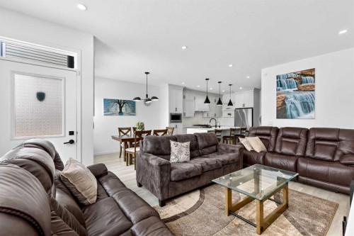 41 Copperhead Road Se, Calgary, AB - Indoor Photo Showing Living Room