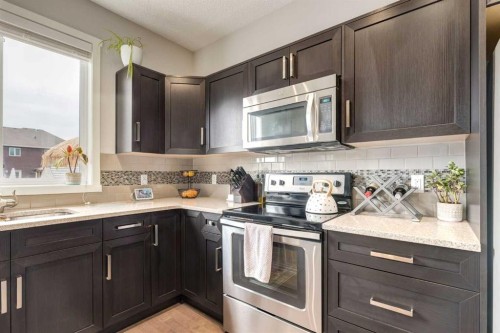 38 Legacy Boulevard Se, Calgary, AB - Indoor Photo Showing Kitchen