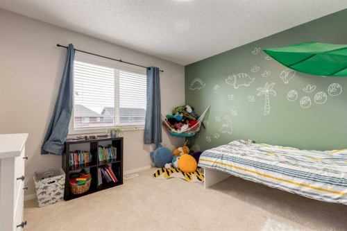 38 Legacy Boulevard Se, Calgary, AB - Indoor Photo Showing Bedroom