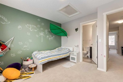 38 Legacy Boulevard Se, Calgary, AB - Indoor Photo Showing Bedroom