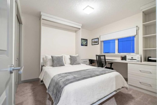 127 Lake Placid Close Se, Calgary, AB - Indoor Photo Showing Bedroom