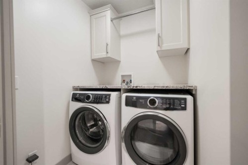 127 Lake Placid Close Se, Calgary, AB - Indoor Photo Showing Laundry Room