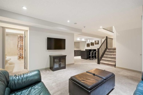 127 Lake Placid Close Se, Calgary, AB - Indoor Photo Showing Living Room With Fireplace