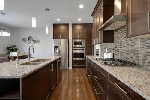 216 Carringvue Manor Nw, Calgary, AB - Indoor Photo Showing Kitchen With Stainless Steel Kitchen With Double Sink With Upgraded Kitchen
