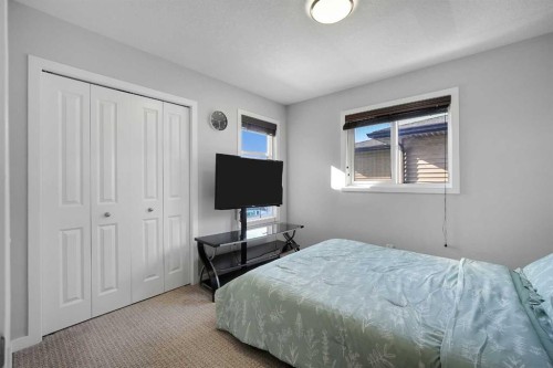 216 Carringvue Manor Nw, Calgary, AB - Indoor Photo Showing Bedroom