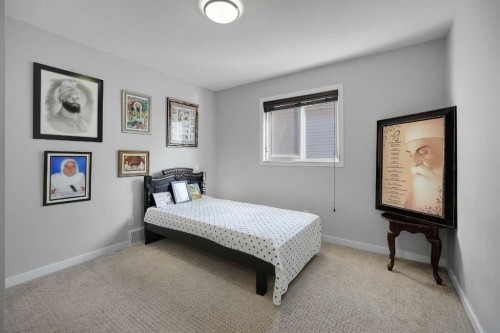 216 Carringvue Manor Nw, Calgary, AB - Indoor Photo Showing Bedroom