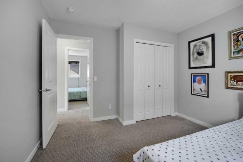 216 Carringvue Manor Nw, Calgary, AB - Indoor Photo Showing Bedroom