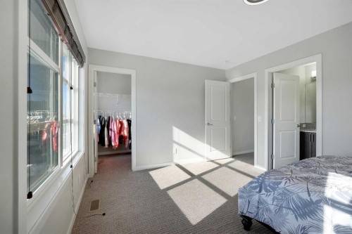 216 Carringvue Manor Nw, Calgary, AB - Indoor Photo Showing Bedroom