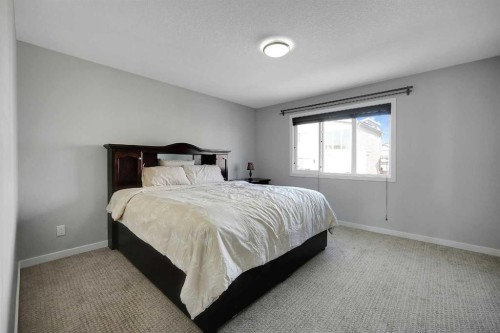 216 Carringvue Manor Nw, Calgary, AB - Indoor Photo Showing Bedroom