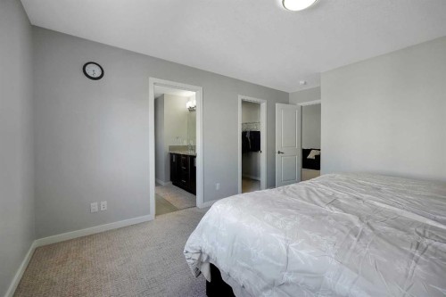 216 Carringvue Manor Nw, Calgary, AB - Indoor Photo Showing Bedroom