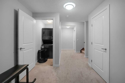 216 Carringvue Manor Nw, Calgary, AB - Indoor Photo Showing Other Room