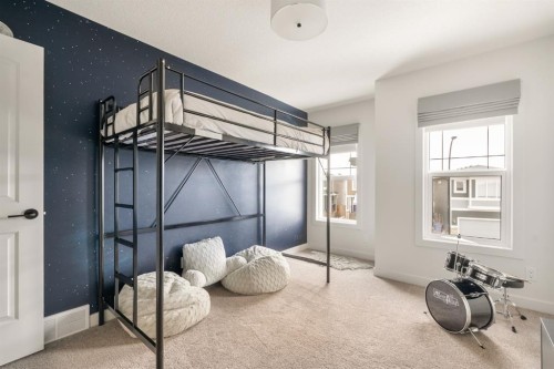 29 Cranbrook Park Se, Calgary, AB - Indoor Photo Showing Bedroom