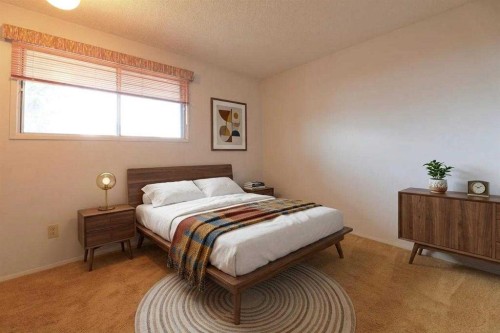 6501 Coach Hill Road Sw, Calgary, AB - Indoor Photo Showing Bedroom