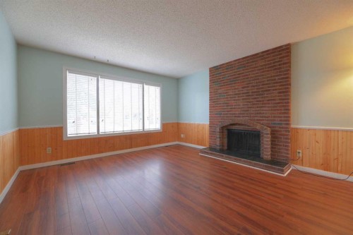 6501 Coach Hill Road Sw, Calgary, AB - Indoor With Fireplace