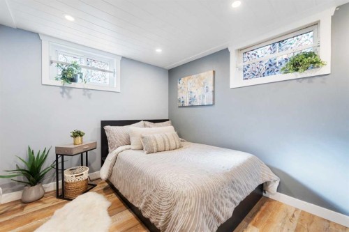 6 Grove Hill Place Sw, Calgary, AB - Indoor Photo Showing Bedroom