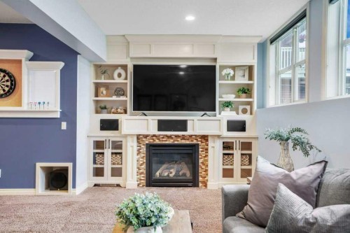 127 Hillcrest Boulevard, Strathmore, AB - Indoor Photo Showing Living Room With Fireplace