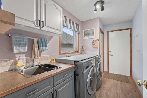 30 Cranston Place Se, Calgary, AB - Indoor Photo Showing Laundry Room