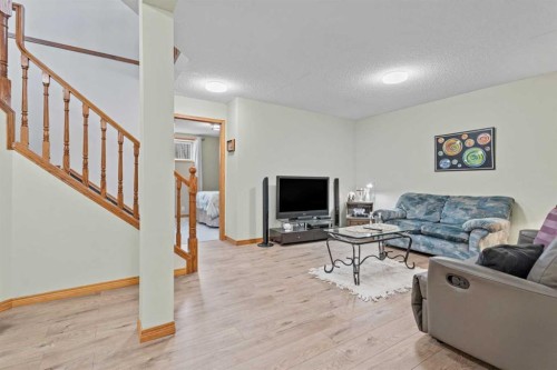 30 Cranston Place Se, Calgary, AB - Indoor Photo Showing Living Room