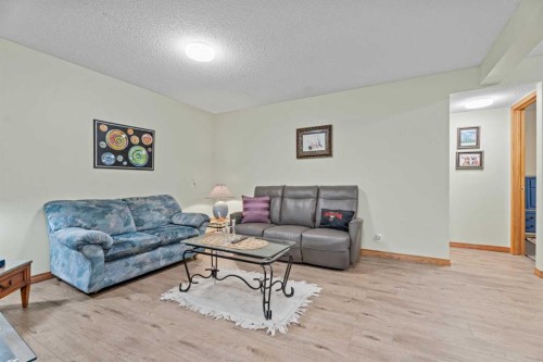 30 Cranston Place Se, Calgary, AB - Indoor Photo Showing Living Room
