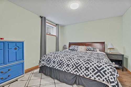 30 Cranston Place Se, Calgary, AB - Indoor Photo Showing Bedroom