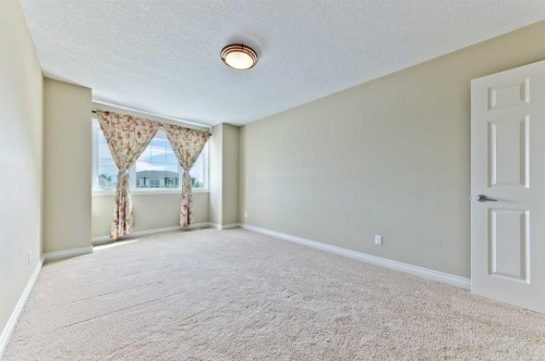 60 Elmont Rise Sw, Calgary, AB - Indoor Photo Showing Other Room