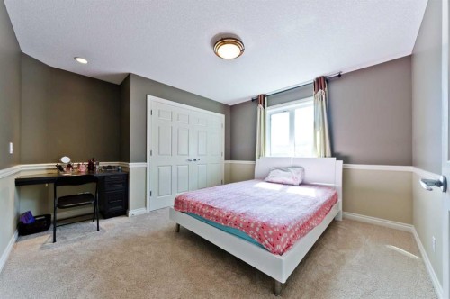 60 Elmont Rise Sw, Calgary, AB - Indoor Photo Showing Bedroom