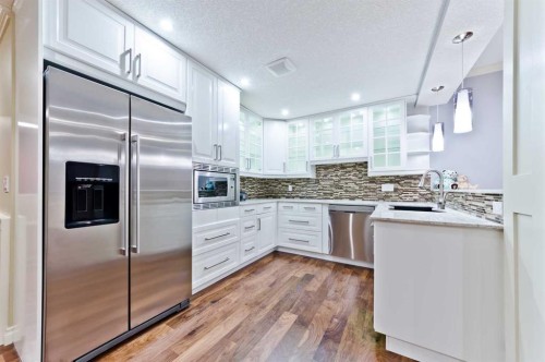 60 Elmont Rise Sw, Calgary, AB - Indoor Photo Showing Kitchen With Upgraded Kitchen