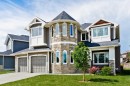 60 Elmont Rise Sw, Calgary, AB  - Outdoor With Facade 