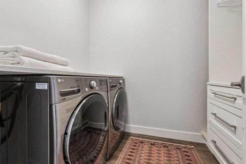 67 Scimitar Heath Nw, Calgary, AB - Indoor Photo Showing Laundry Room