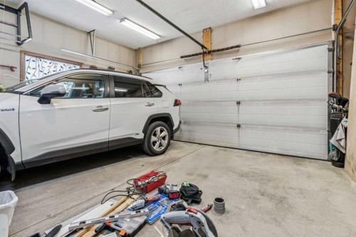 67 Scimitar Heath Nw, Calgary, AB - Indoor Photo Showing Garage